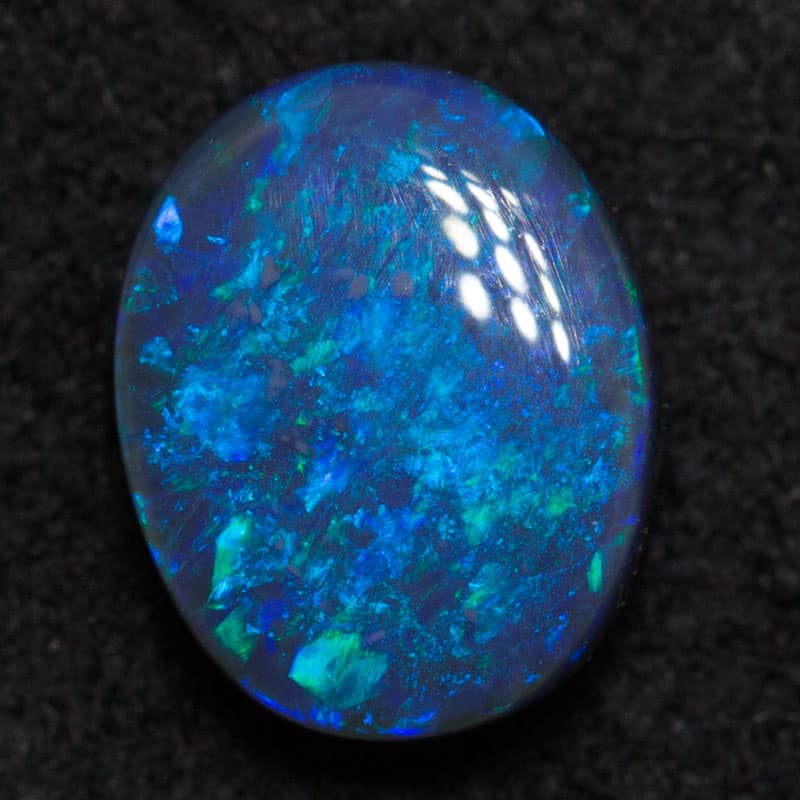 0.88 ct black opal 7.6x6x3mm
