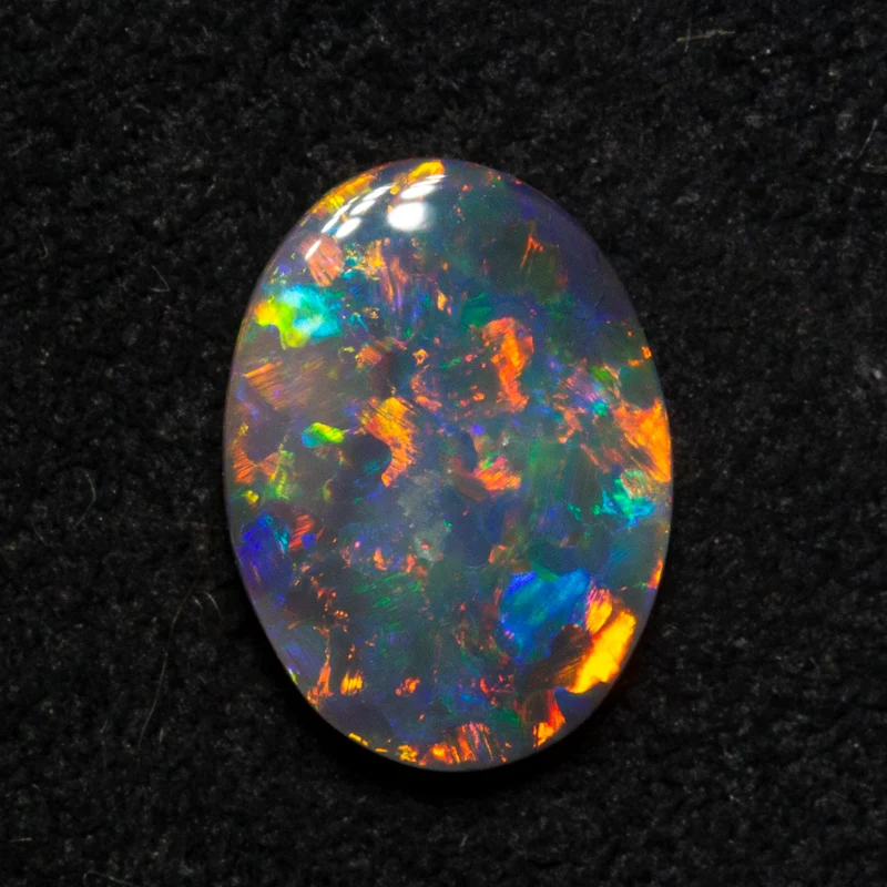 0.90 ct black opal 9.2x6.7x2.3mm - Image 2
