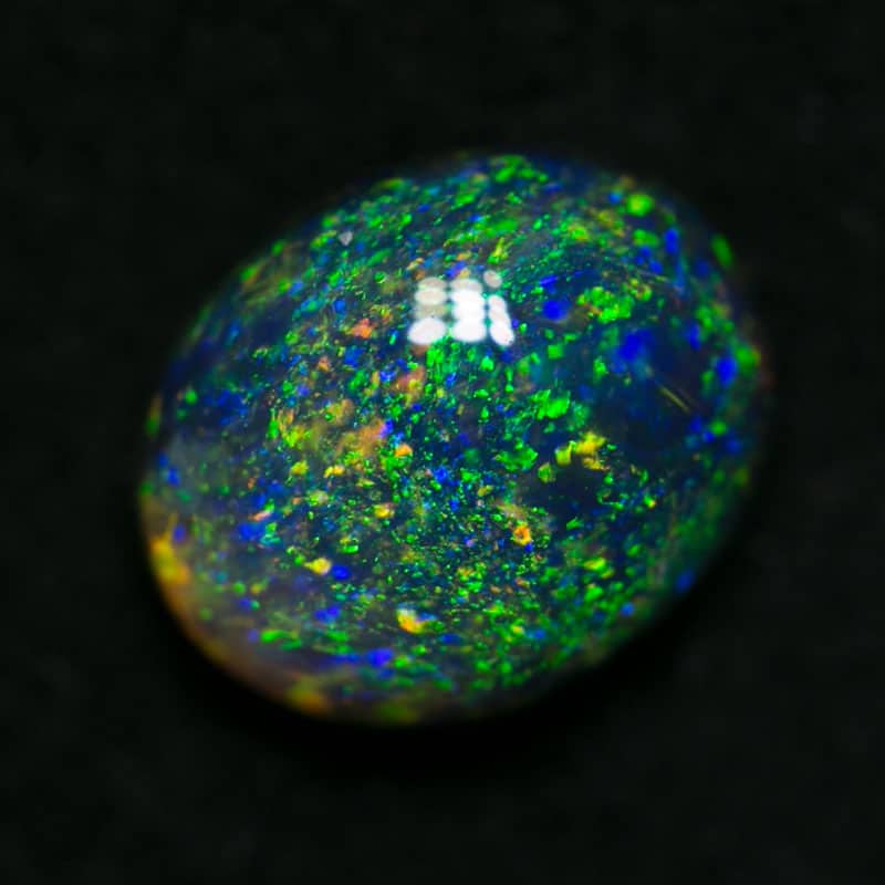 0.91 ct black opal 7x5.5x3.5mm