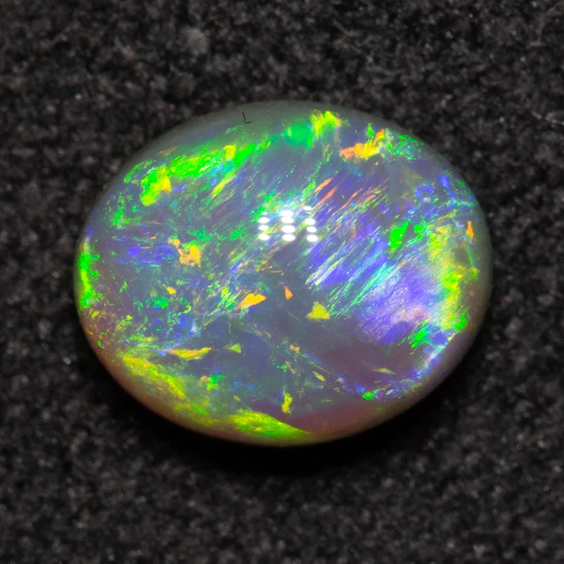 0.94 ct crystal opal 6.8x5.6x3.8mm - Image 3