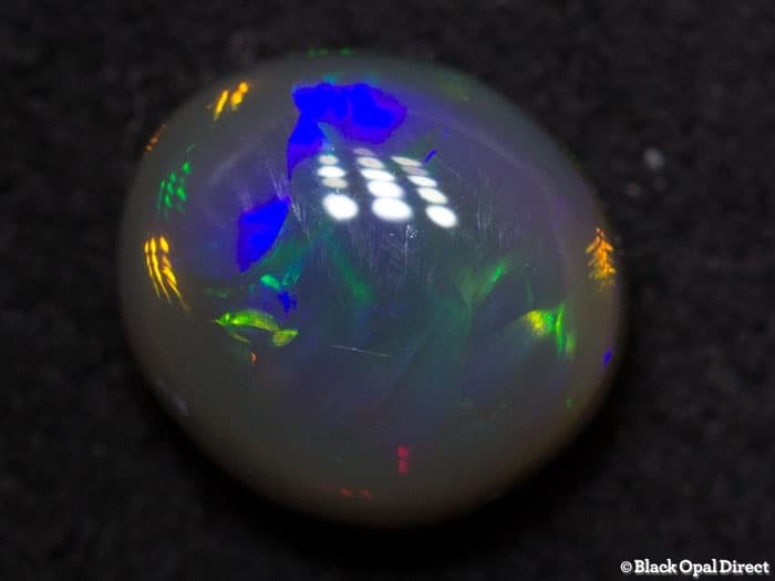 0.98 ct semi black opal 7x6x4mm