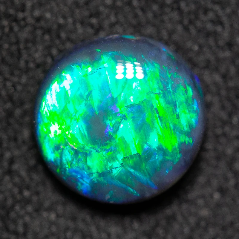 1.03 ct black opal 7x7x3mm