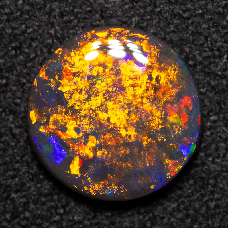 1.06 ct black opal 8.3x8.3x2.2mm - Image 2
