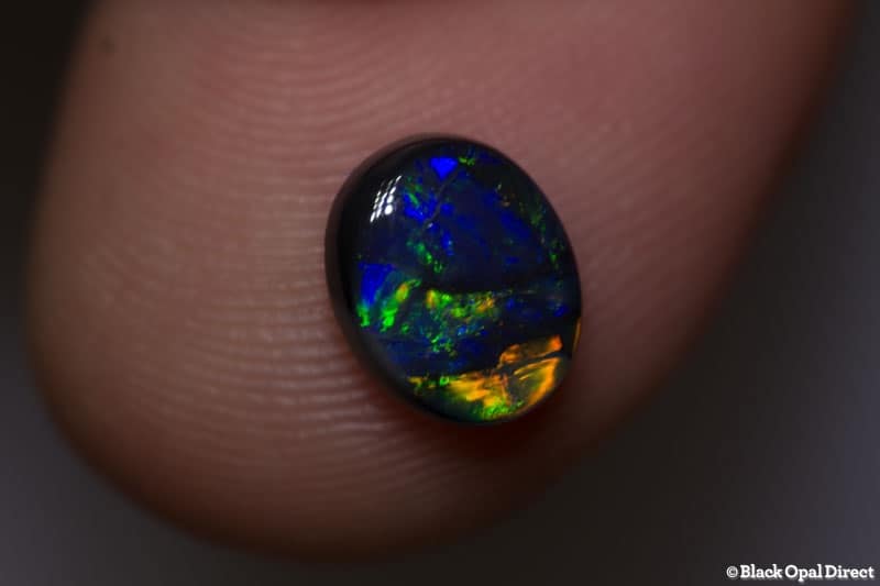 1.06 ct black opal 8x6.5x3mm