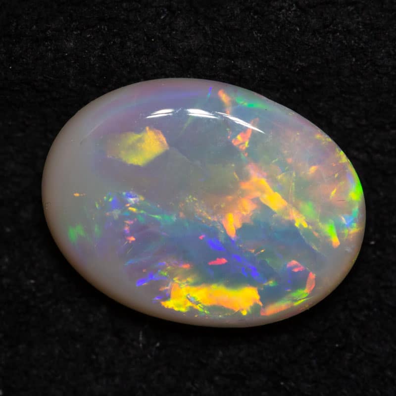 1.06 ct dark opal 9x7x3mm