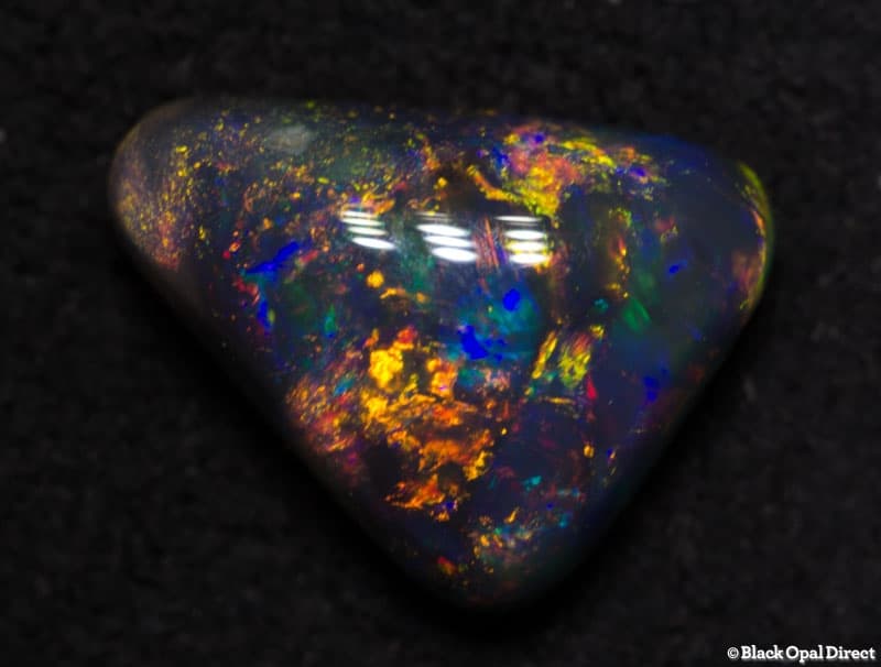 1.11 ct triangular black opal gem 8x6x4mm abdi