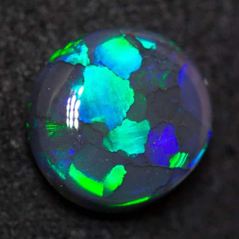 1.23 ct black opal 7.9x7.3x3.3mm