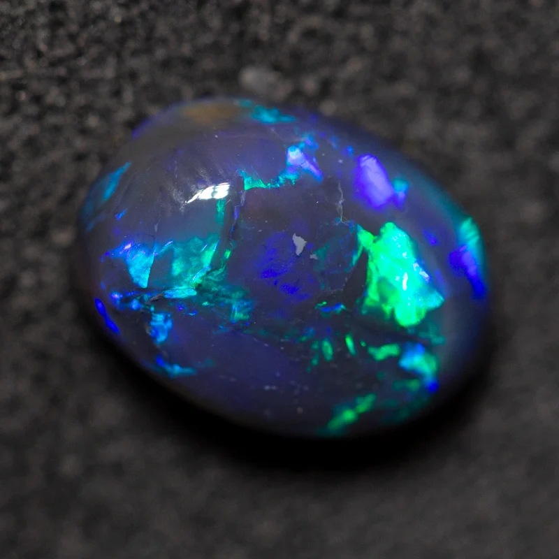 1.23 ct black opal 8.3x6.1x3.9mm