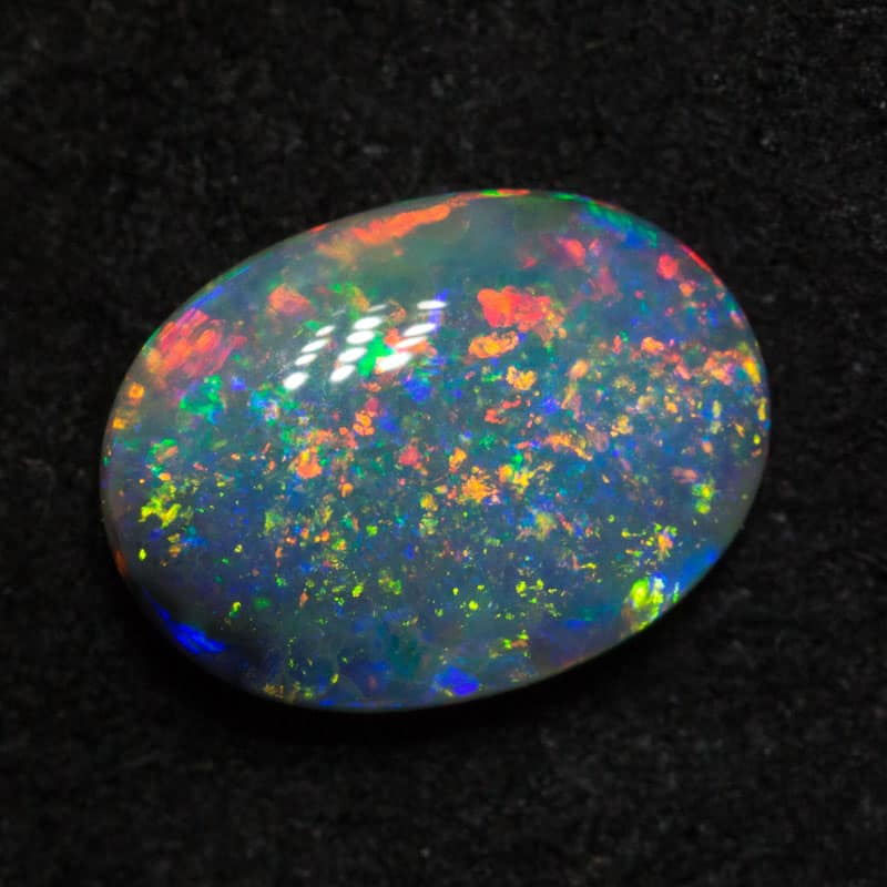 1.24 ct black opal 9.5x7x2.9mm