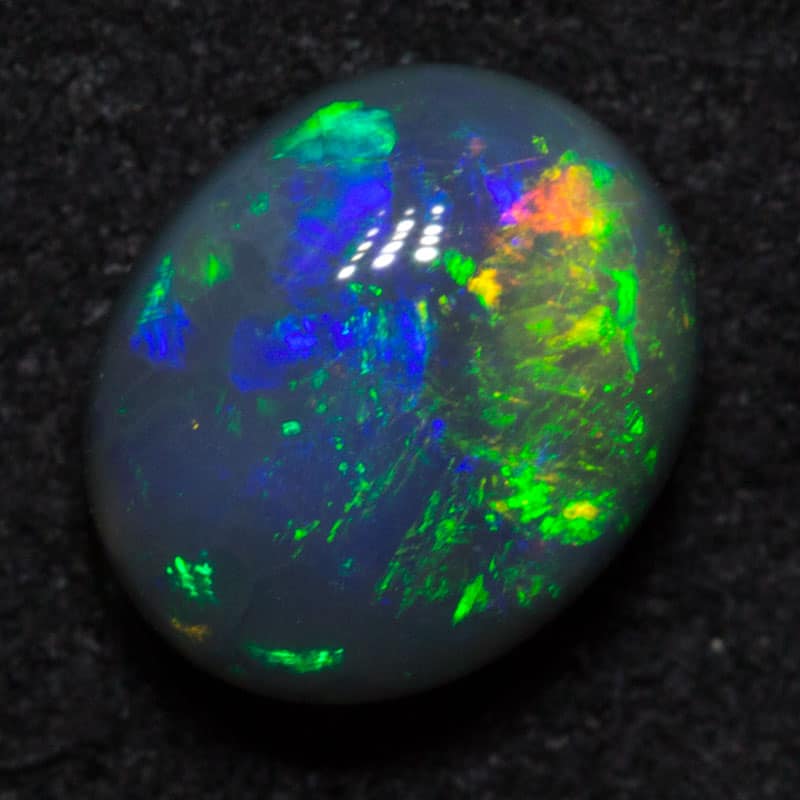 1.25 ct black opal 7.6x6.4x4.1mm