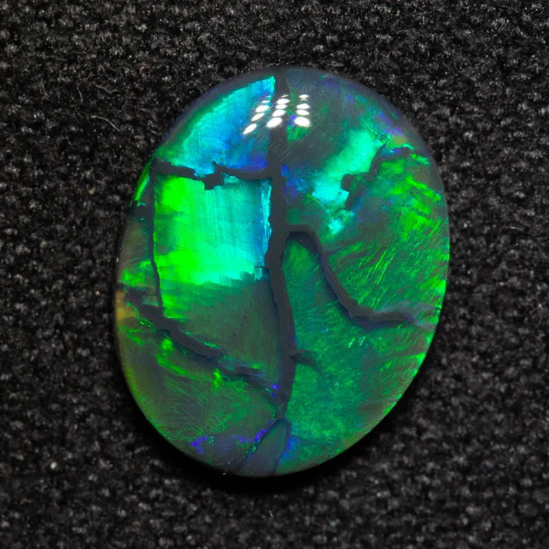 1.25 ct black opal 9.6x7.6x2.6mm