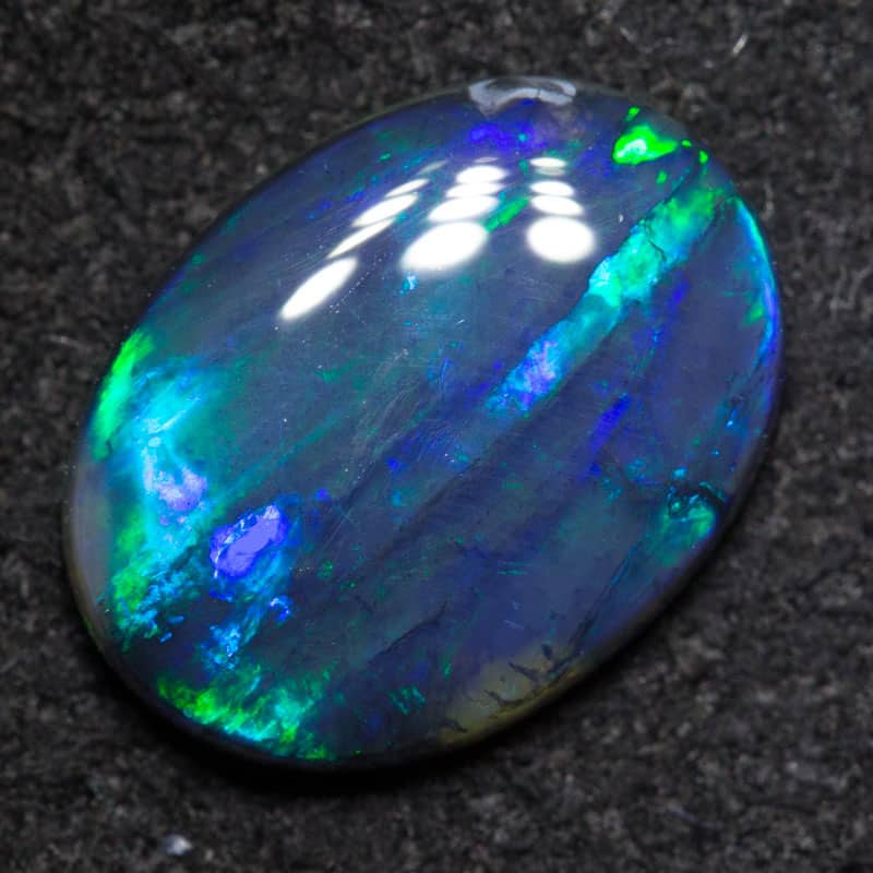 1.35 ct black opal 10.2x7.6x2.6mm