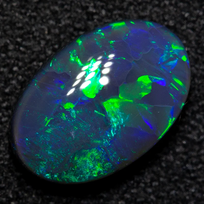 1.35 ct black opal 9.6x6.4x3.6mm