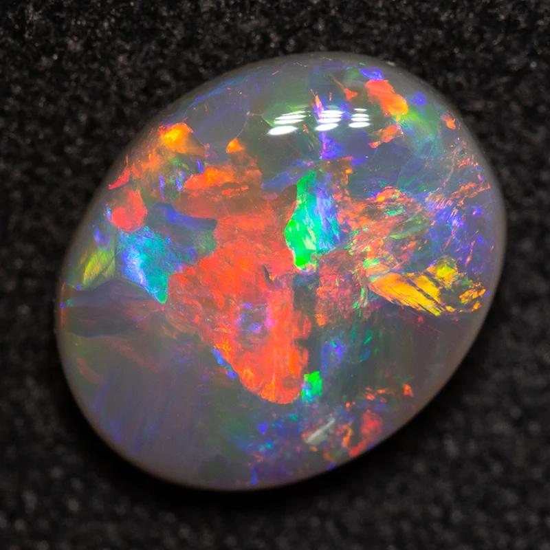 1.46 ct dark opal 9.2x7.6x3.2mm