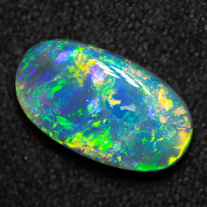 1.53 ct black opal 11x6.2x3.4mm - Image 2