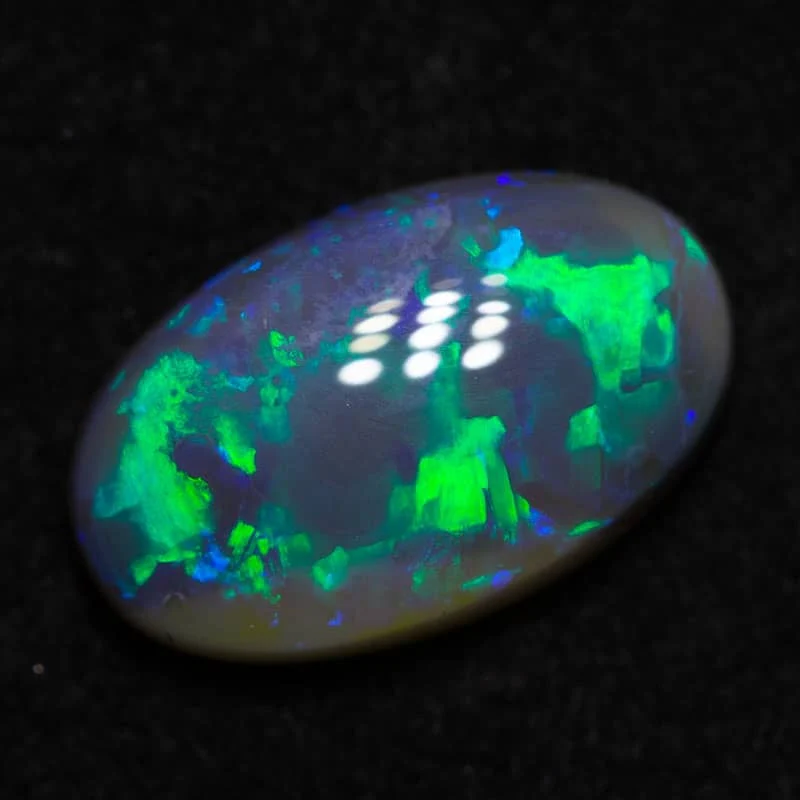 1.55 ct dark opal 11x7x3mm