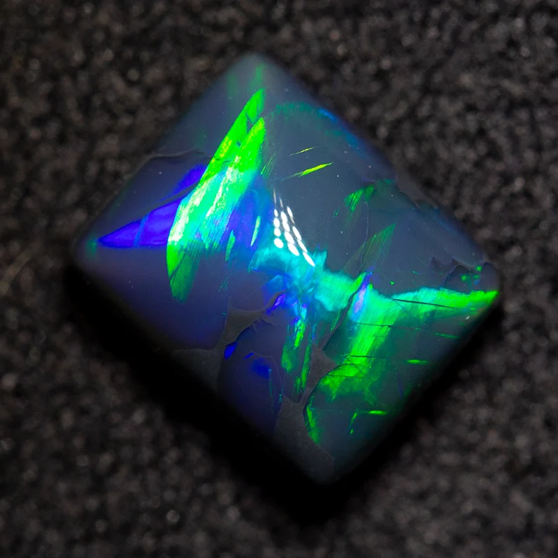 1.59 ct black opal 7.5x6.2x4.6mm
