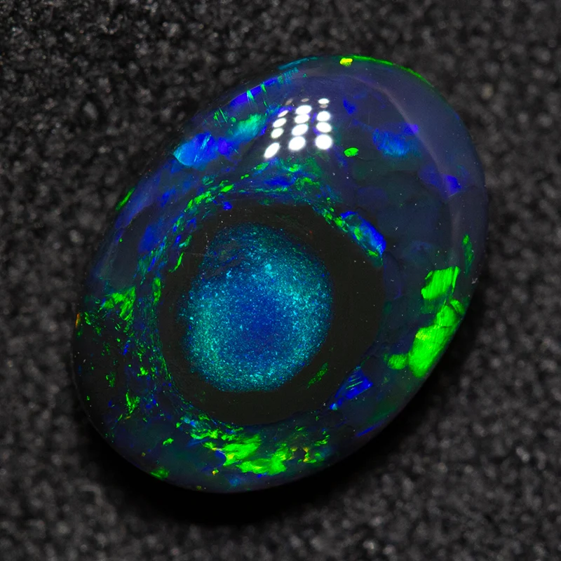 1.60 ct black opal 9.4x6.9x3.7mm
