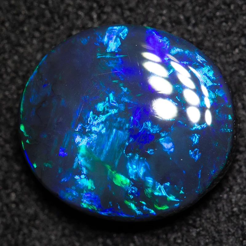 1.69 ct black opal 9.5x8.5x3.3mm