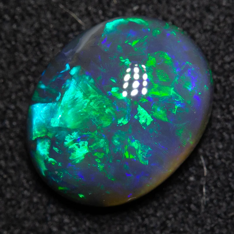 1.76 ct black opal 9.5x7.5x3.5mm