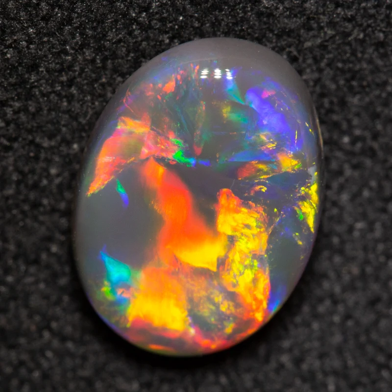 1.82 ct black opal 10.3x7.6x3.9mm