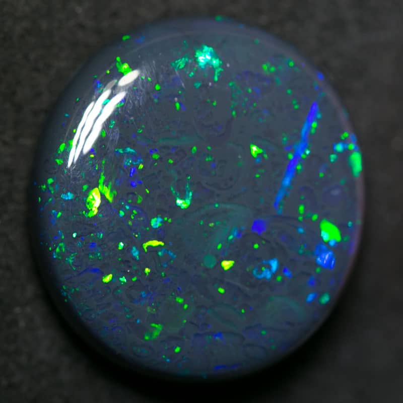 10.41 ct black opal 17.5x16x5mm