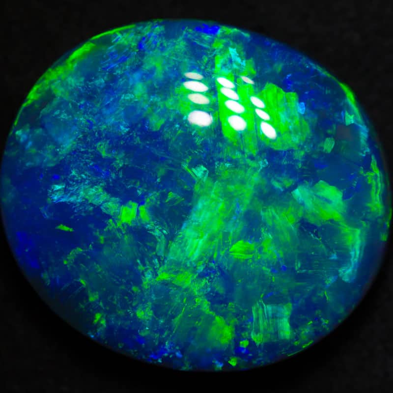 15.44 ct gem black opal 19.5x17x6.8mm