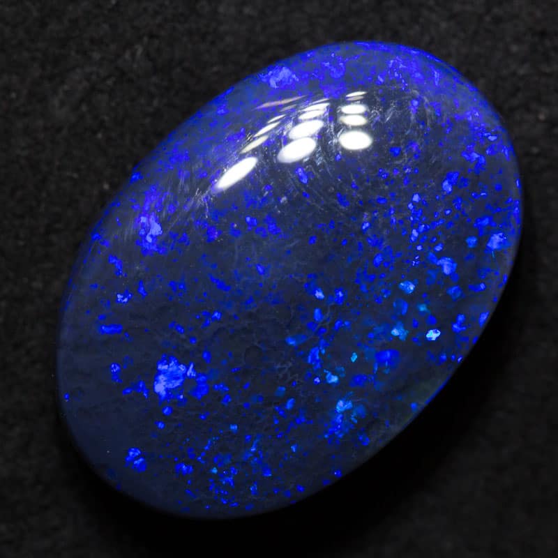 16.07 ct black opal 21x14.7x7.9mm