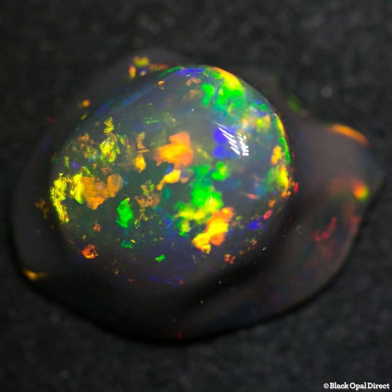 16.10 ct black opal carving 22x17x9mm