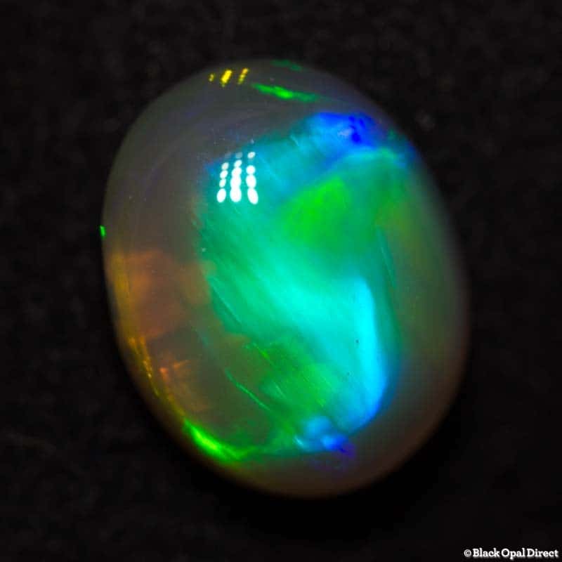 2.23 ct crystal opal with the letter S in it 10x8x4.5mm