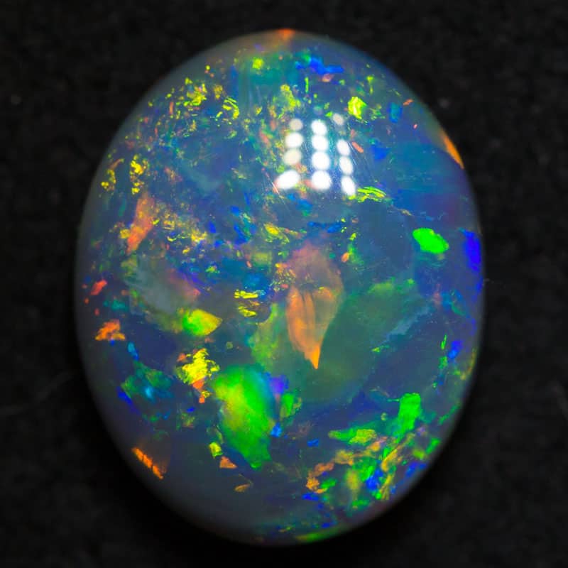 2.24 ct gem dark opal 10.4x8.3x4.1mm