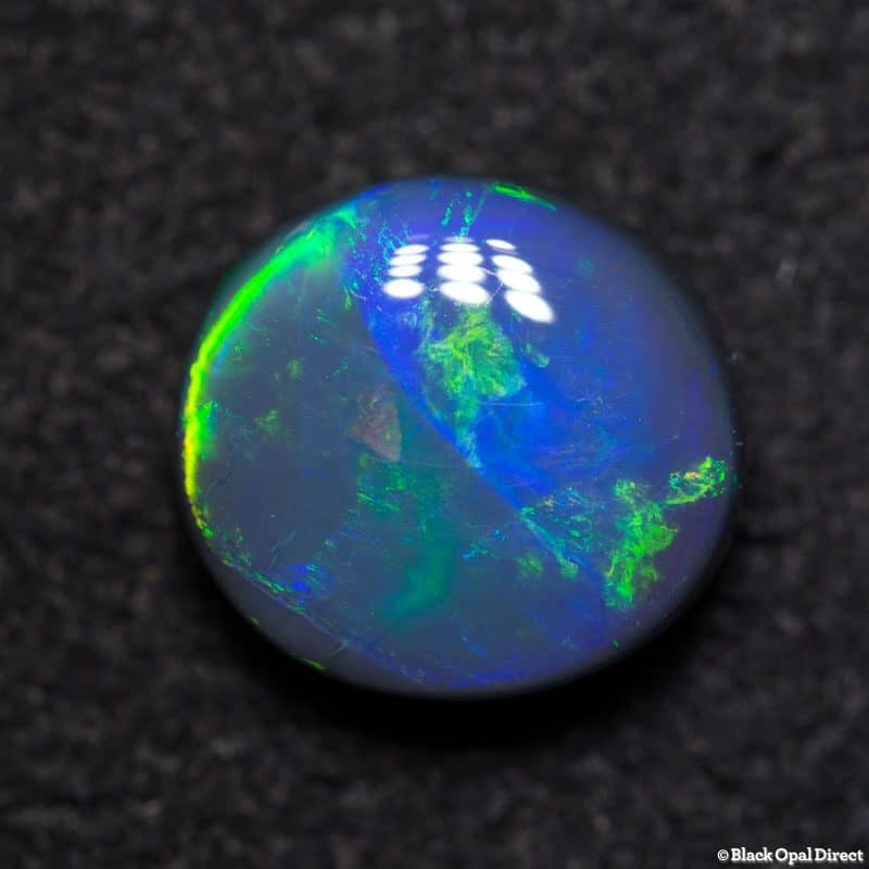 2.45 ct black opal 9x8x5mm