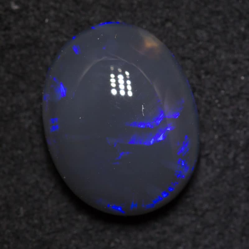 2.55 ct black opal 11x8.8x4.6mm