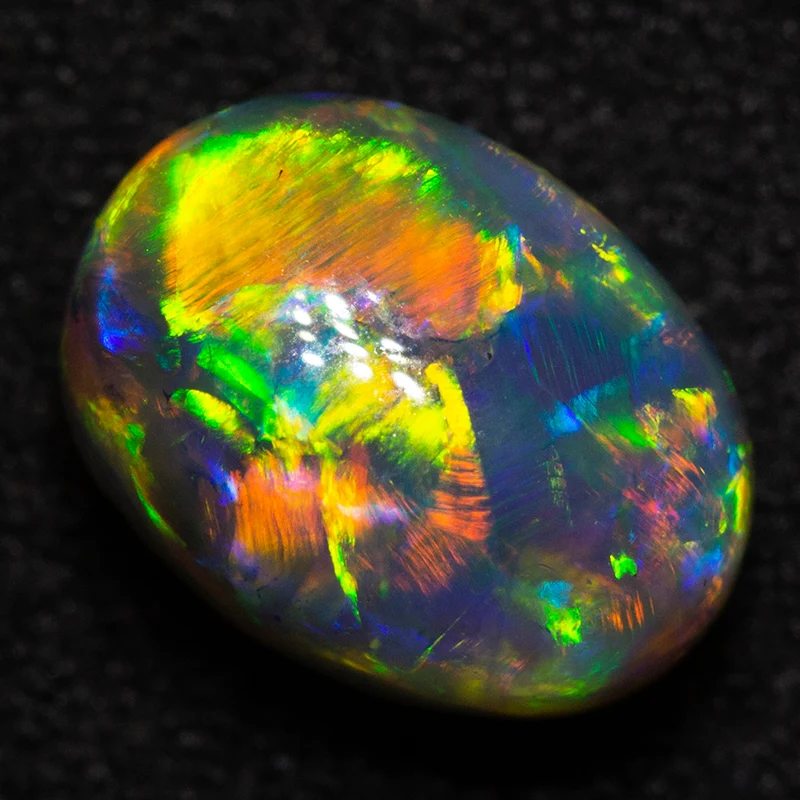 2.55 ct gem dark crystal opal 9.4x7.1x6.6mm