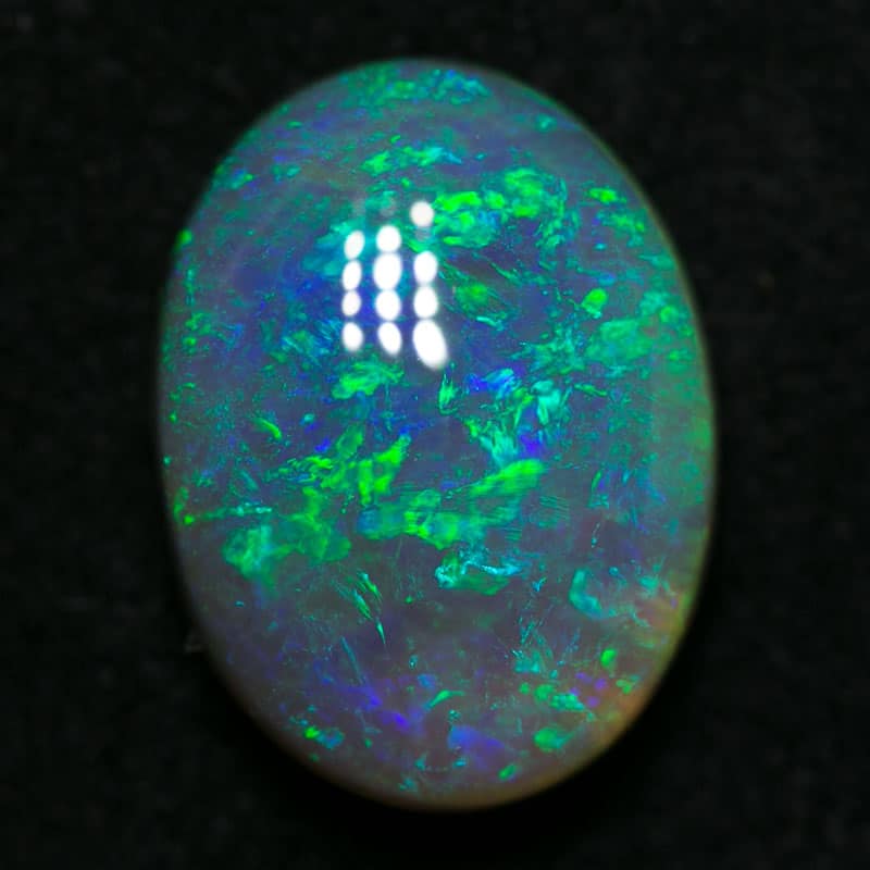 2.76 ct dark opal 11x8.5x4.5mm