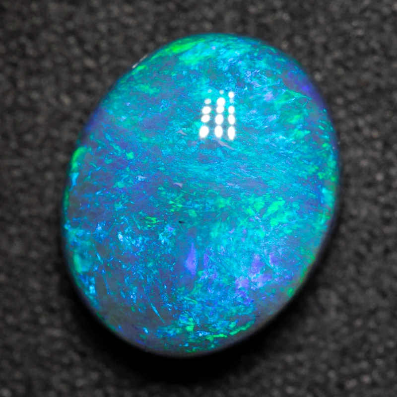 2.99 ct black opal 10.5x8.6x5.3mm