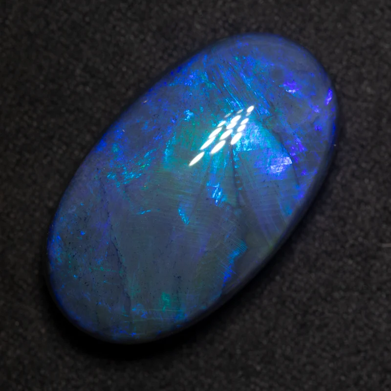 27.52 ct black opal 27x15.5x10.3mm