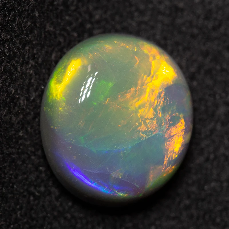 3.01 ct dark opal 10.3x9.3x4.8mm
