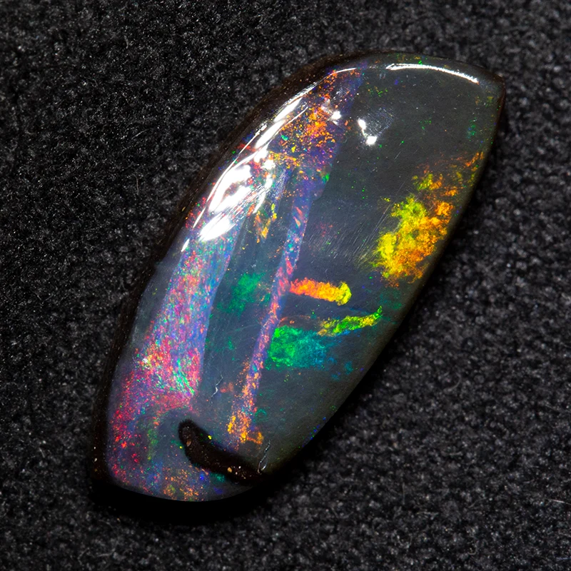 3.07 ct boulder opal 14.1x6.6x3mm