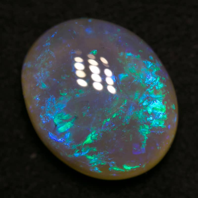 3.19 ct dark crystal opal 11x9x4.5mm