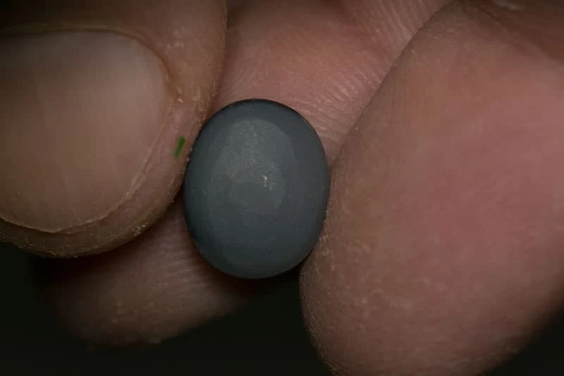3.25 ct dark opal gem 11x9x4.5