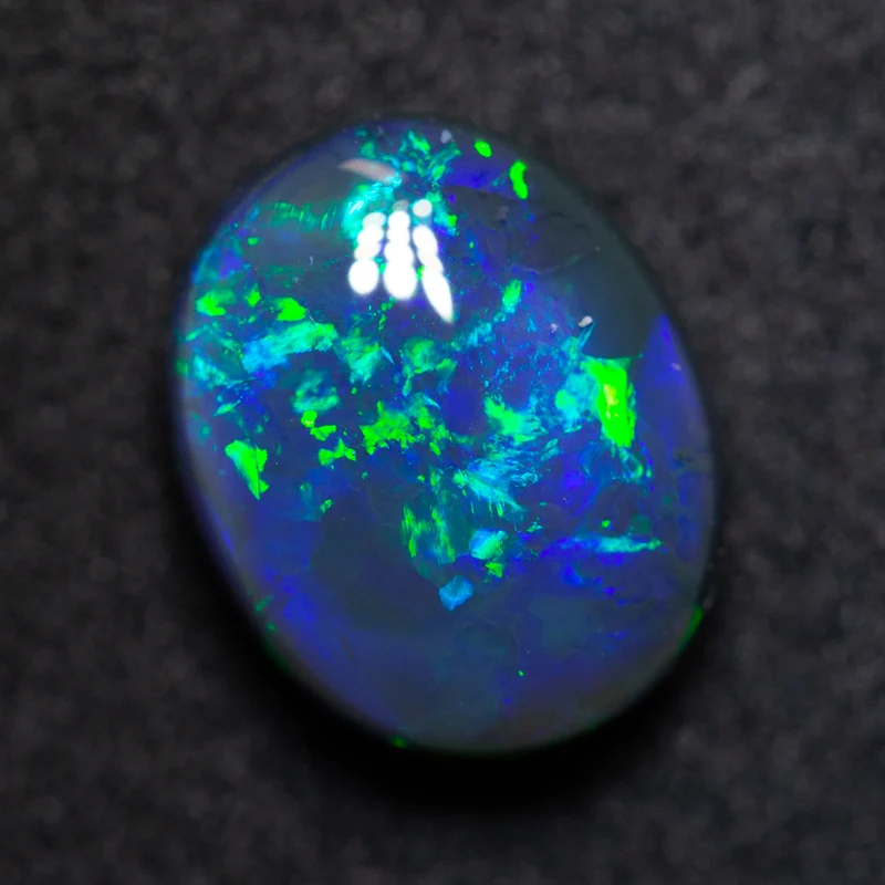 3.27 ct black opal 10.8x8.7x5.2mm
