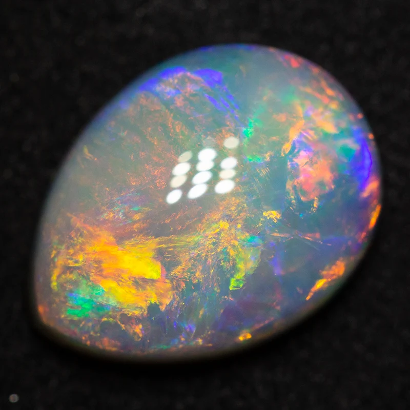 3.49 ct dark opal 12.5x9.5x4.7mm