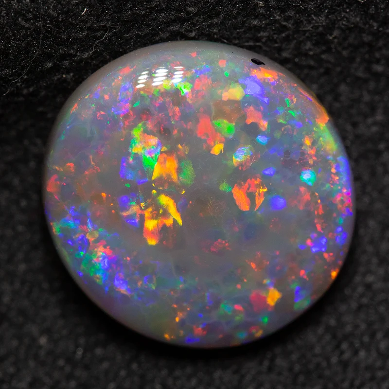 3.63 ct double-sided black opal 11.6x10.8x4.6mm