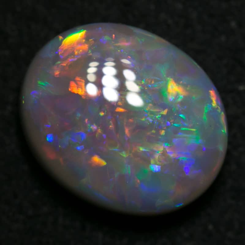 3.68 ct dark opal 12x10x4.5mm