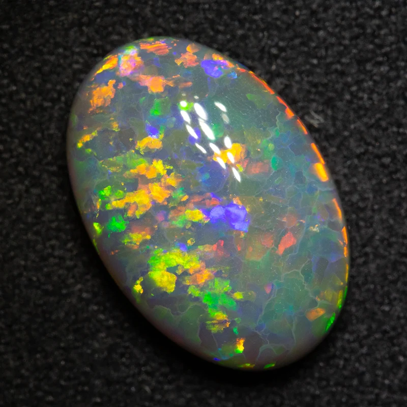 3.76 ct dark opal 13.6x9.3x4.8mm