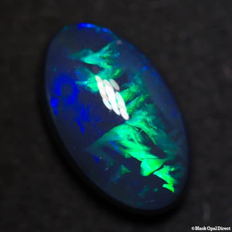 DEPOSIT ONLY 4.06 ct black opal gem with Chinese writing 14x8.5x5mm
