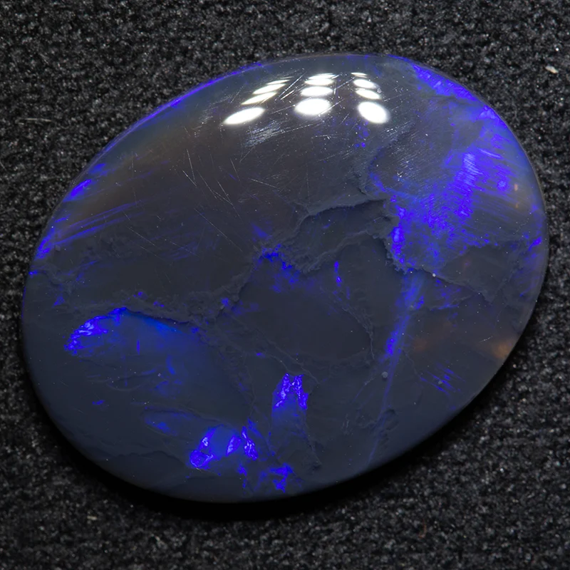 4.22 ct black opal 16.4x12.6x3.1mm