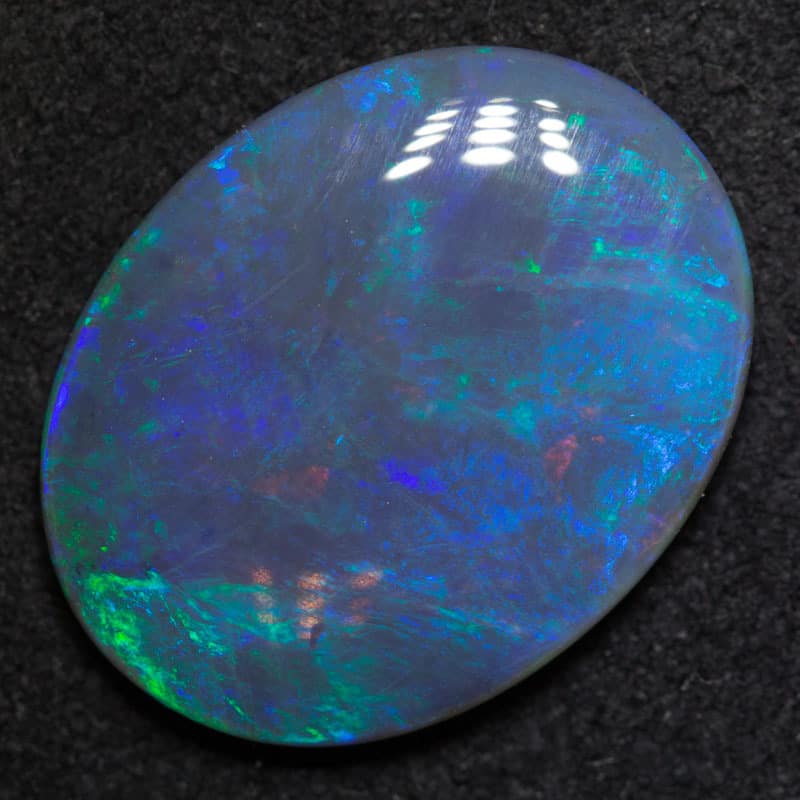 4.52 ct black crystal opal 16.4x12.8x3.5mm
