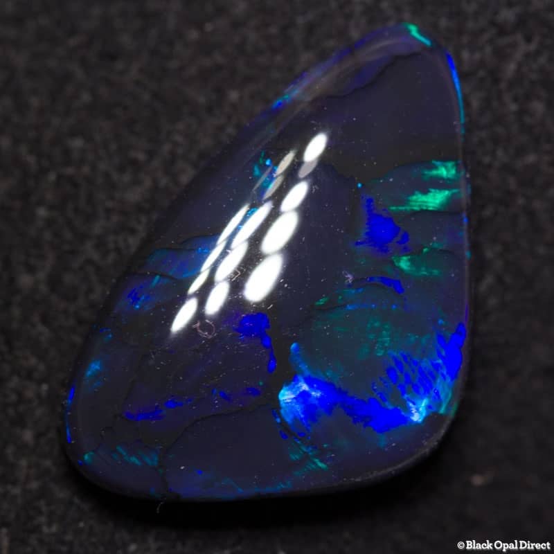 4.73 ct black opal baroque shape 12x11x4.5mm